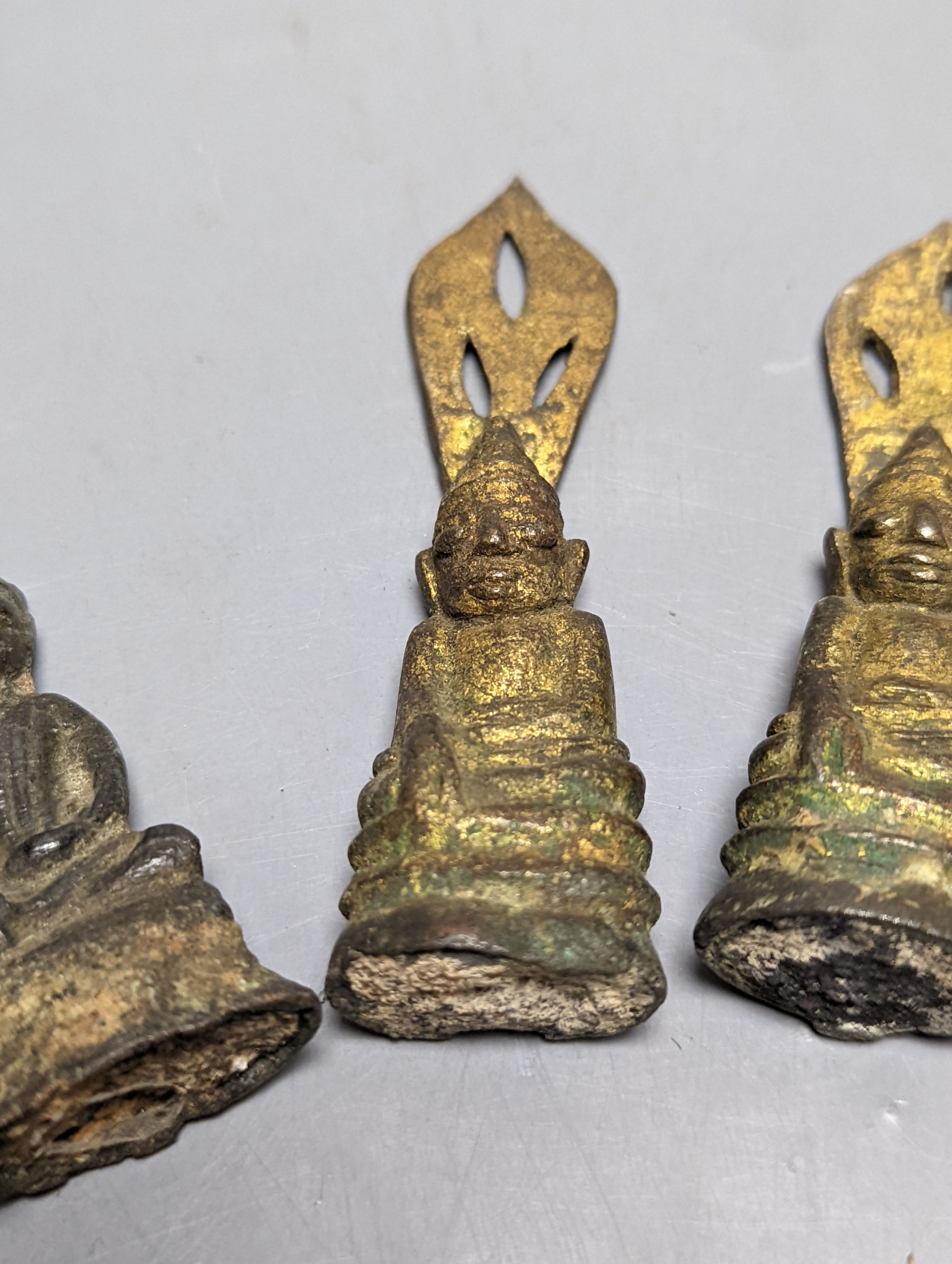 Four brass Buddha